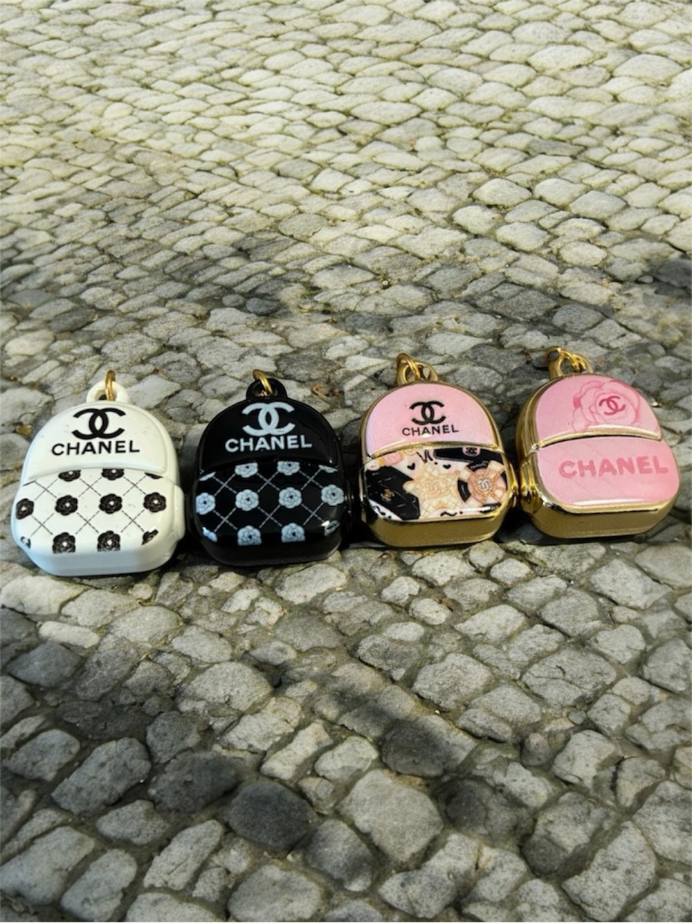 CHANEL Mini Backpack Charms in Black and Pink